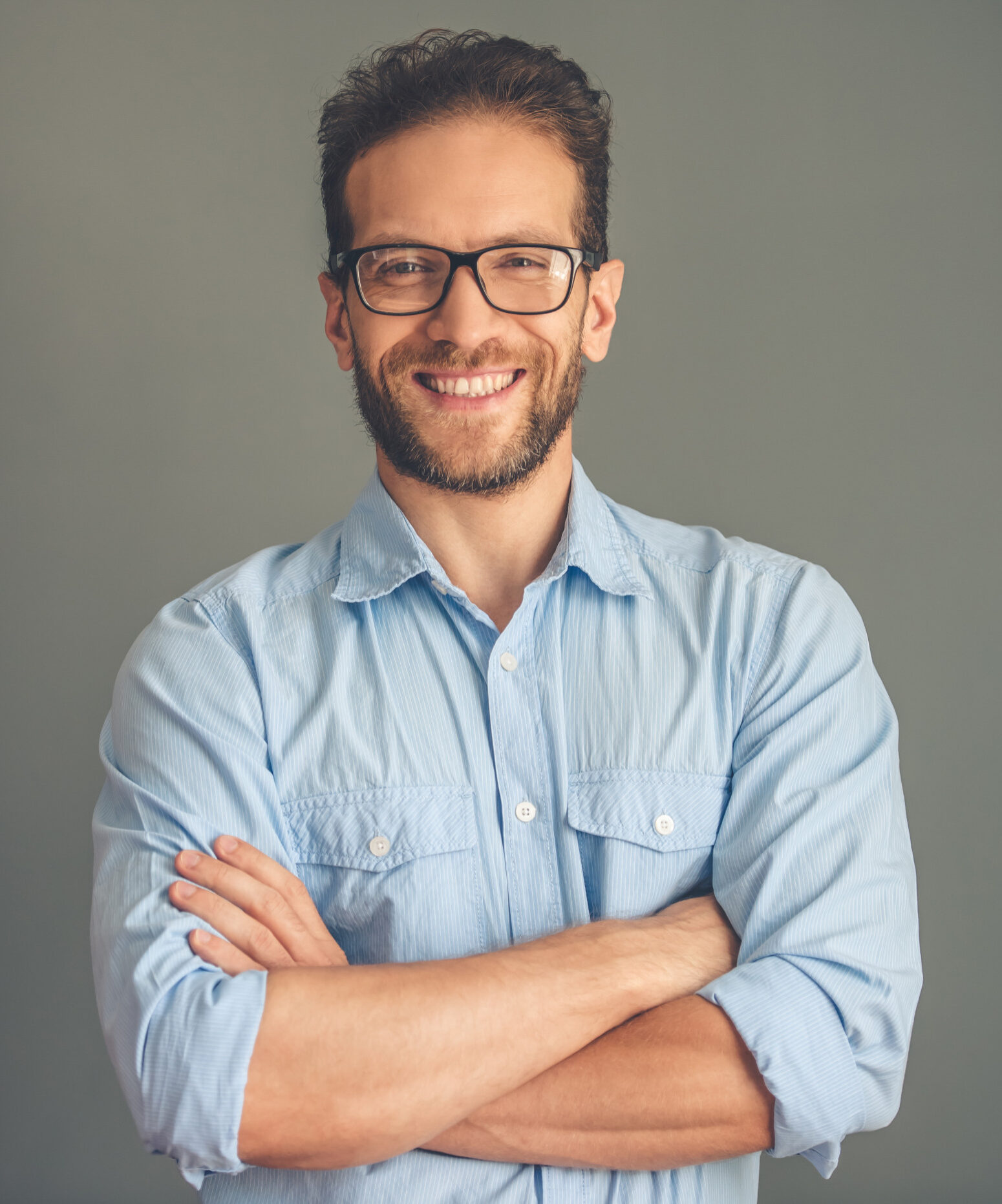 handsome young businessman shirt eyeglasses e1687360303140 handsome young businessman shirt eyeglasses e1687360303140